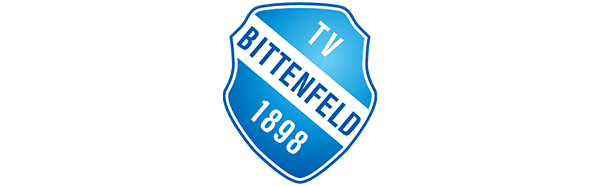 Blaues Vereinswappen des TV Bittenfeld 1898 mit weißer Schrift auf blauem Hintergrund.